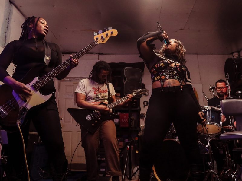 From left to right: Sienna Mahoney (bass), Stephen Peniston (guitar), Pangelica (lead vocals), Zach Inschol (drums)