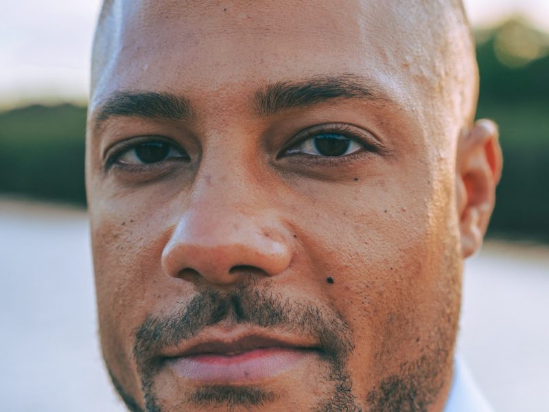 Photo of a man with brown skin.