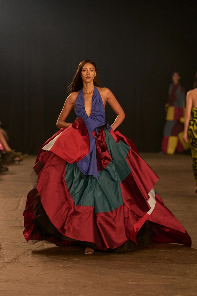 A model walking a runaway wearing a voluminous dress