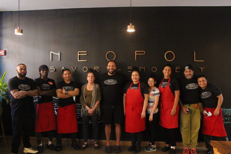 A photograph of the staff at Neopol Savory Smokery.