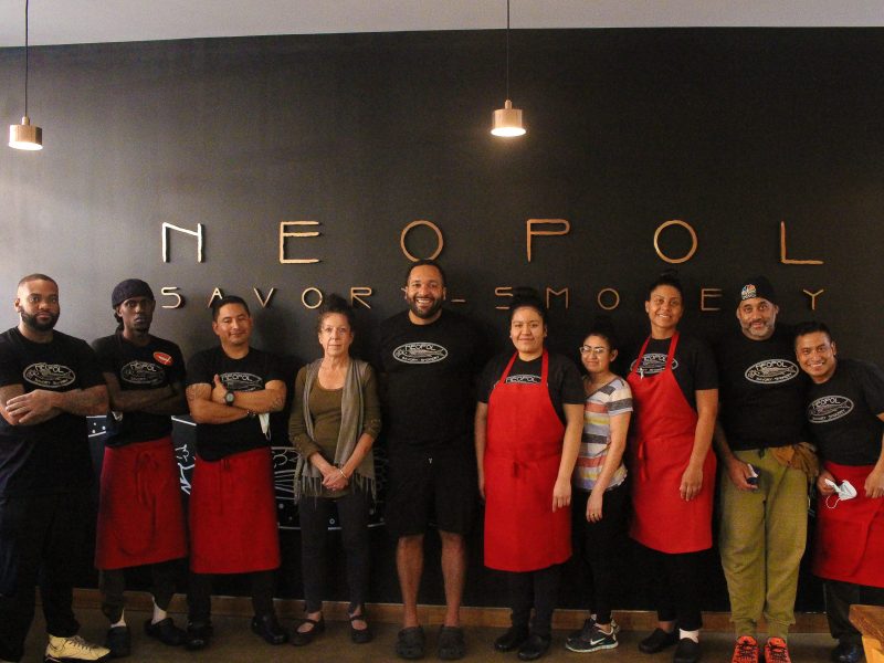 A photograph of the staff at Neopol Savory Smokery.