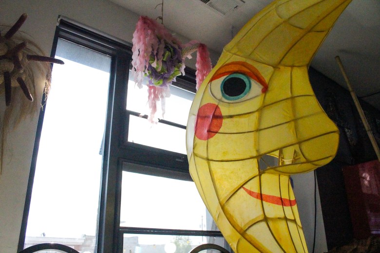 A fully constructed half-moon lantern.