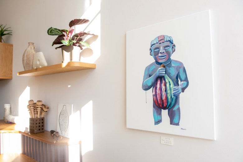 A photograph of a painting on display.