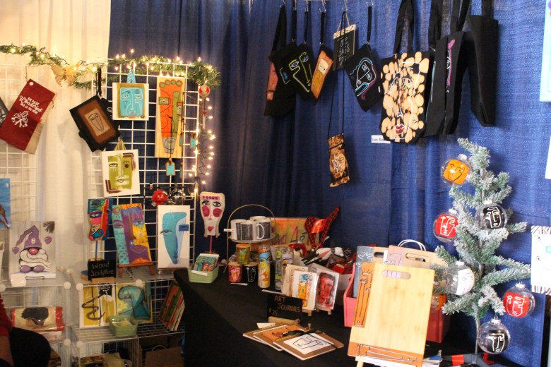 a booth of wares on display at the Baltimore Christmas village. 