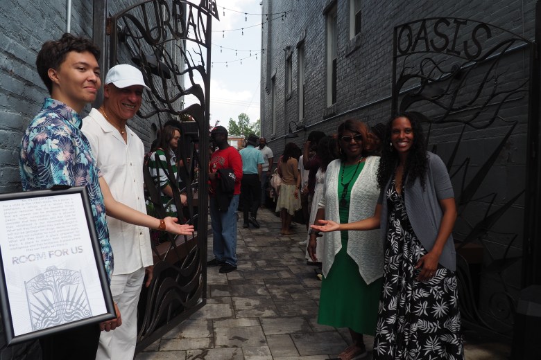 Family and friends of the community being welcomed into The Urban Oasis on May 31.
