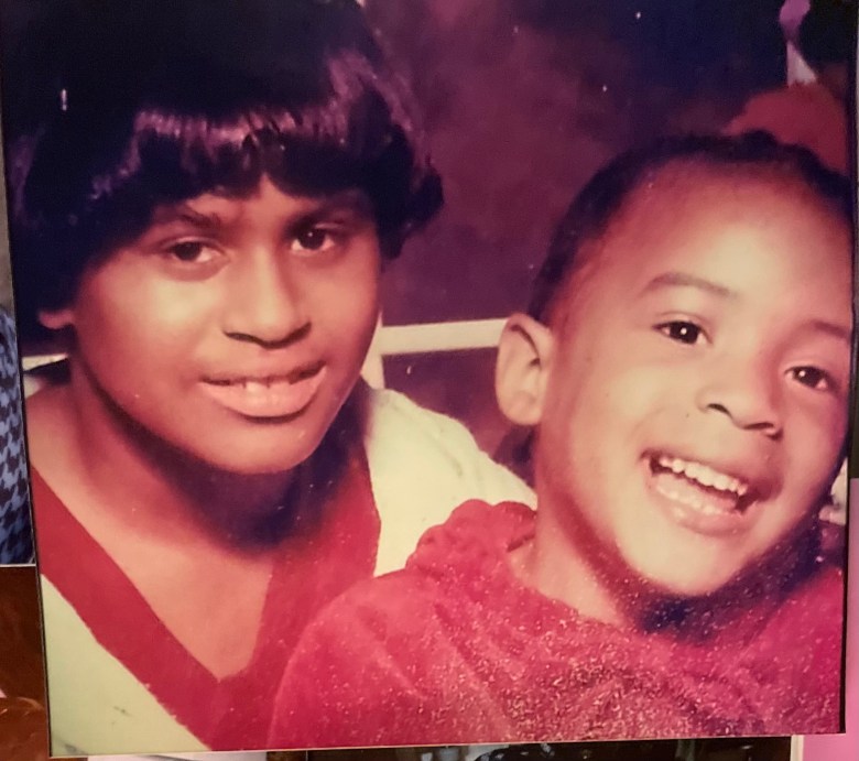 A photo of an two people.