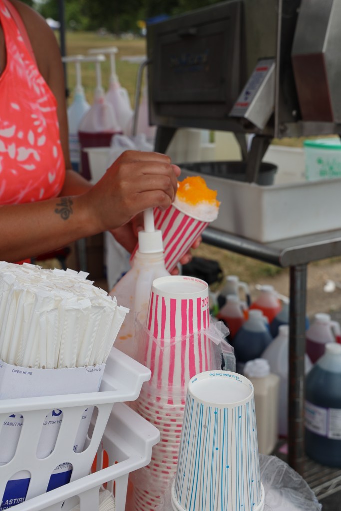 close up photo of a person making snowballs