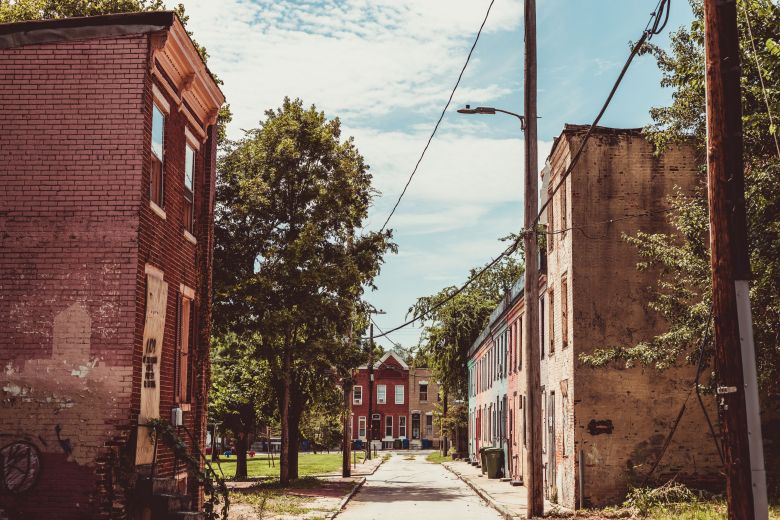 The Sarah Ann Street homes straddle the alleyway concrete street in the Poppleton neighborhood.