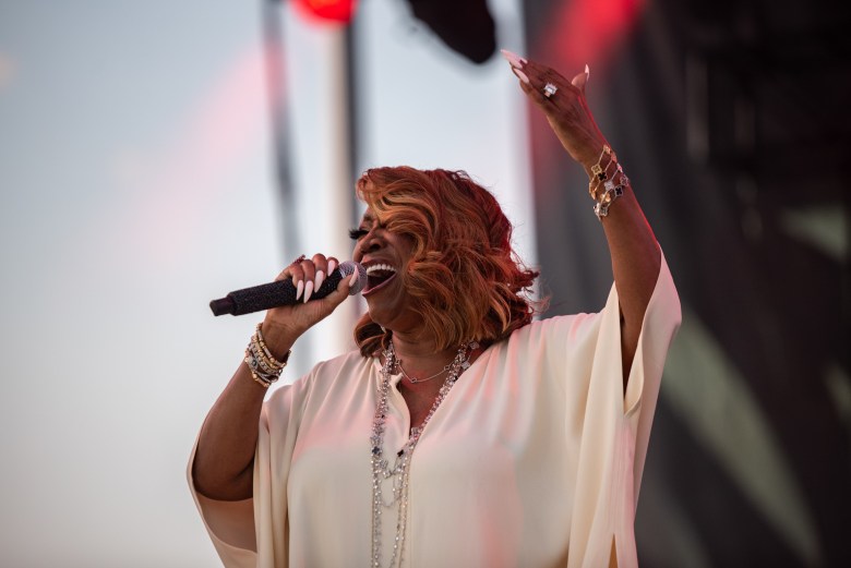 Patti LaBelle, a Black woman, performs on stage.