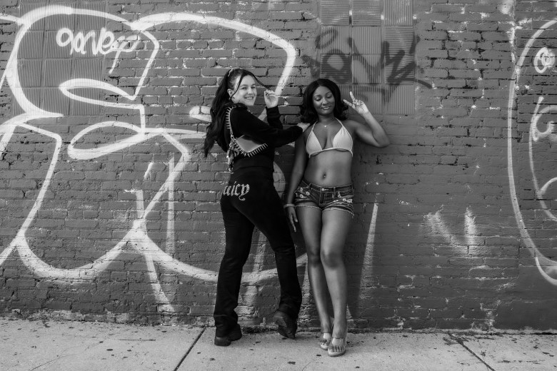 Photo of two people smiling and posing 
