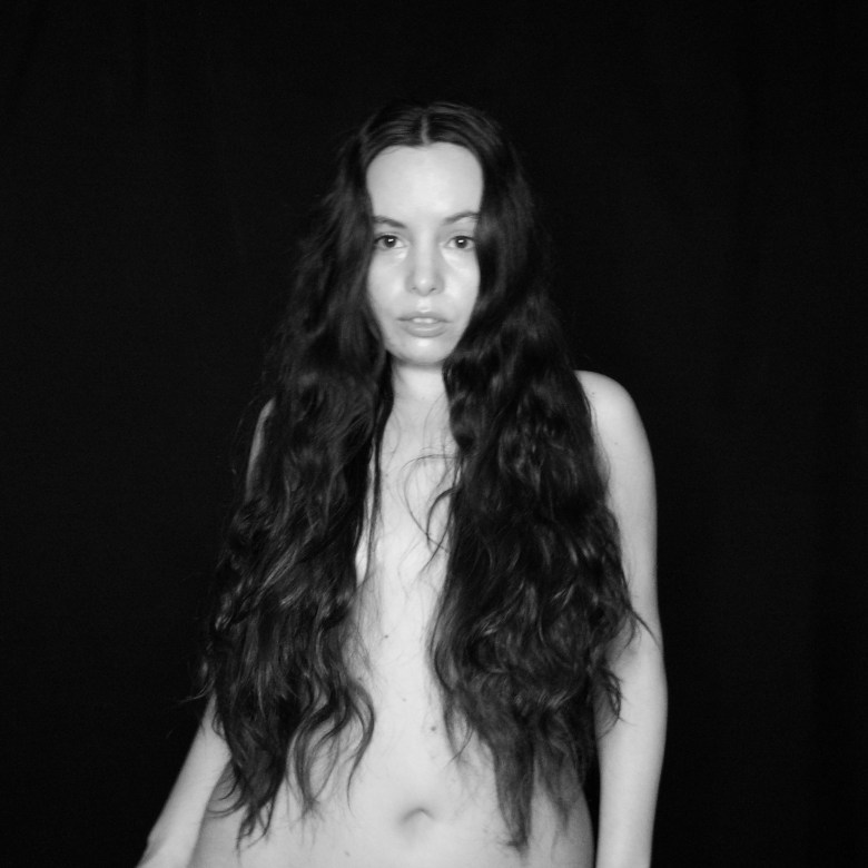 a black and white photo of an artist