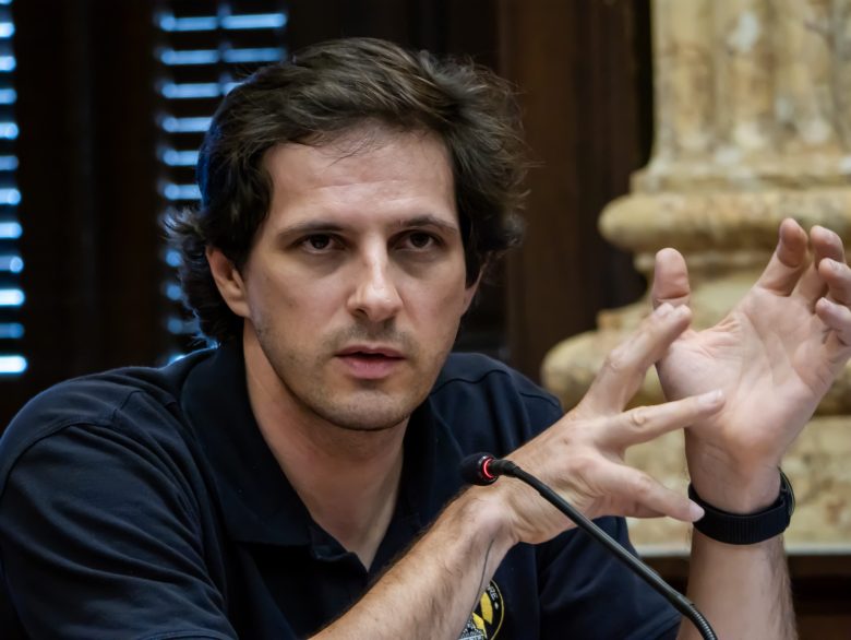 A photo of Baltimore City Councilman Ryan Dorsey. He is a white man with dark hair. He is wearing a dark colored shirt.