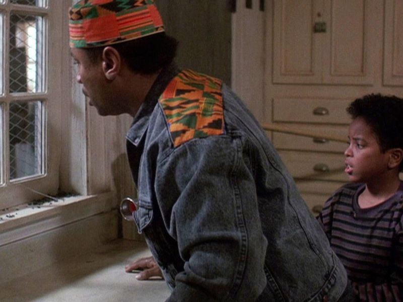 Actor Ving Rhames looks out a window