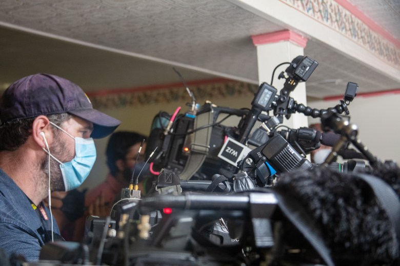 A local television camera person