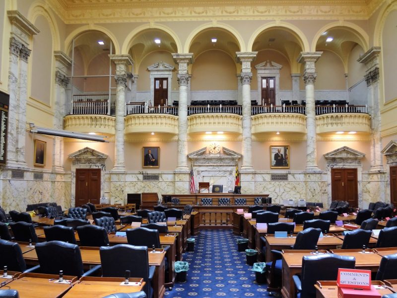 This image depicts rows of chairs and desks inside the Senate Chamber in Annapolis, Md.