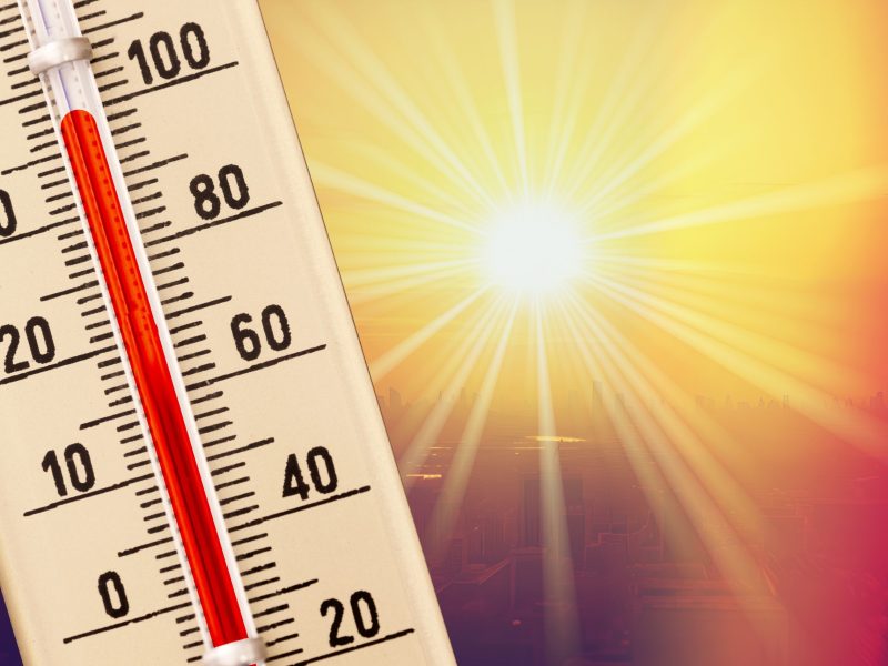 An illustration of the sun and a thermometer.